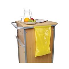A yellow bag attached to a cabinet. 